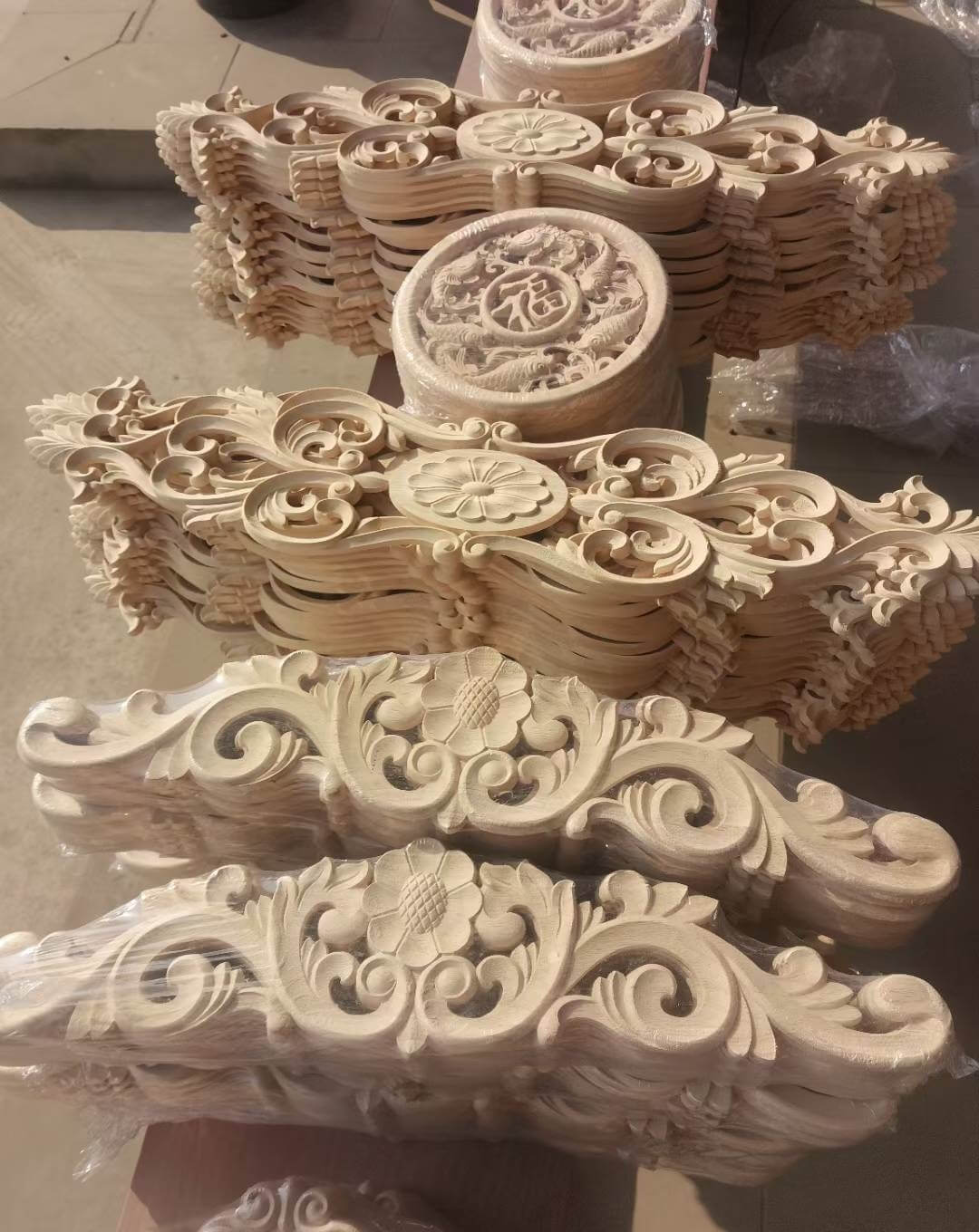 5 different designs of wood appliques